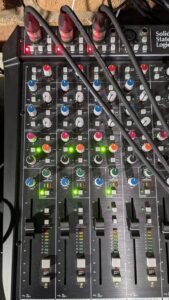 image showing channel strips on an SSL Big 6 audio interface, shows pre-amp, EQ and compression settings